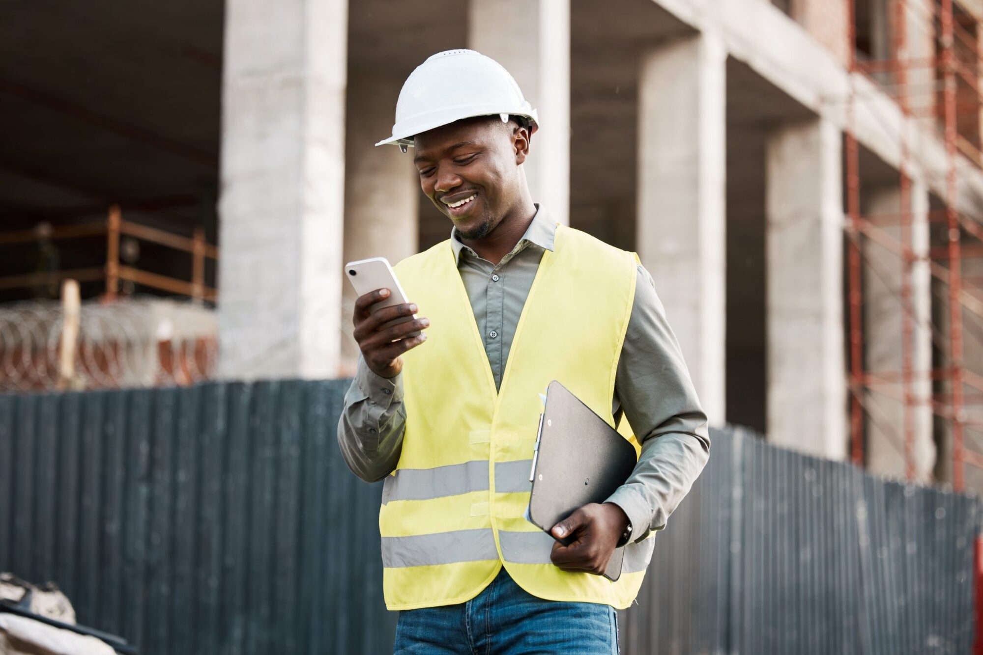 construction worker using enhanced mobile app