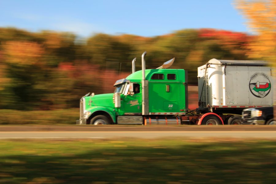 action automotive cargo container driving on road