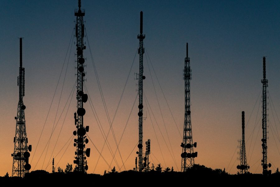 metal towers with sunset in background