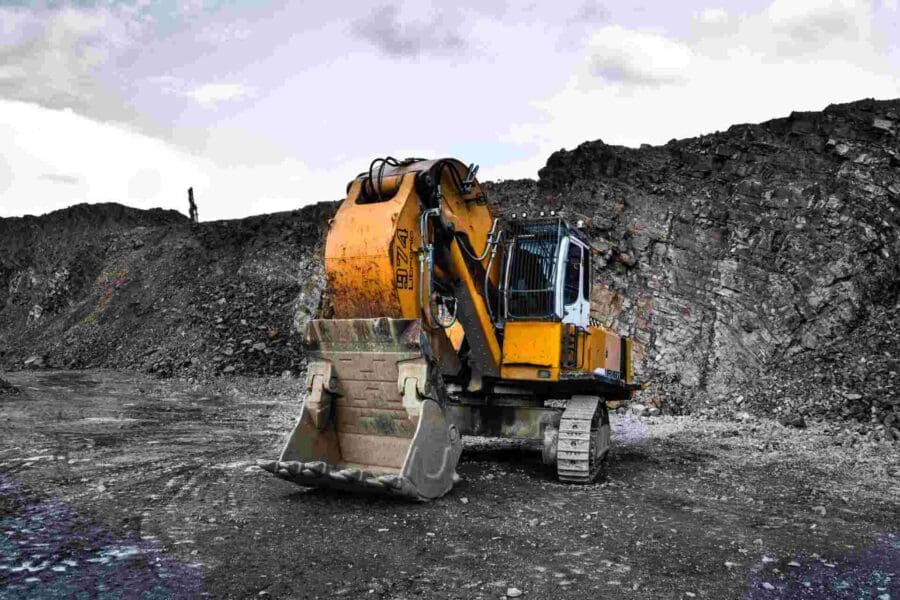 mini excavator on gray gravel jobsite 2