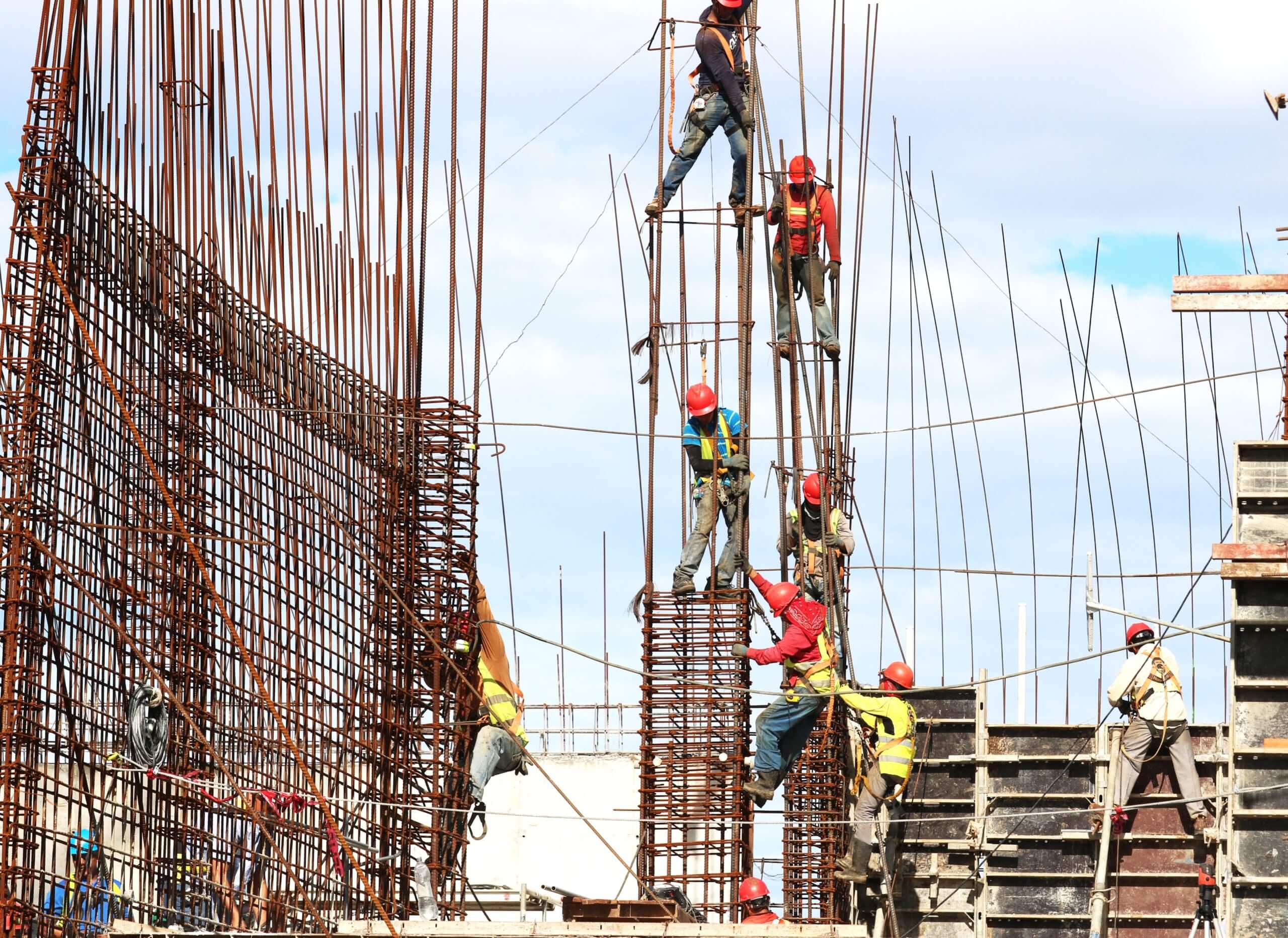 construction workers actively working on jobsite