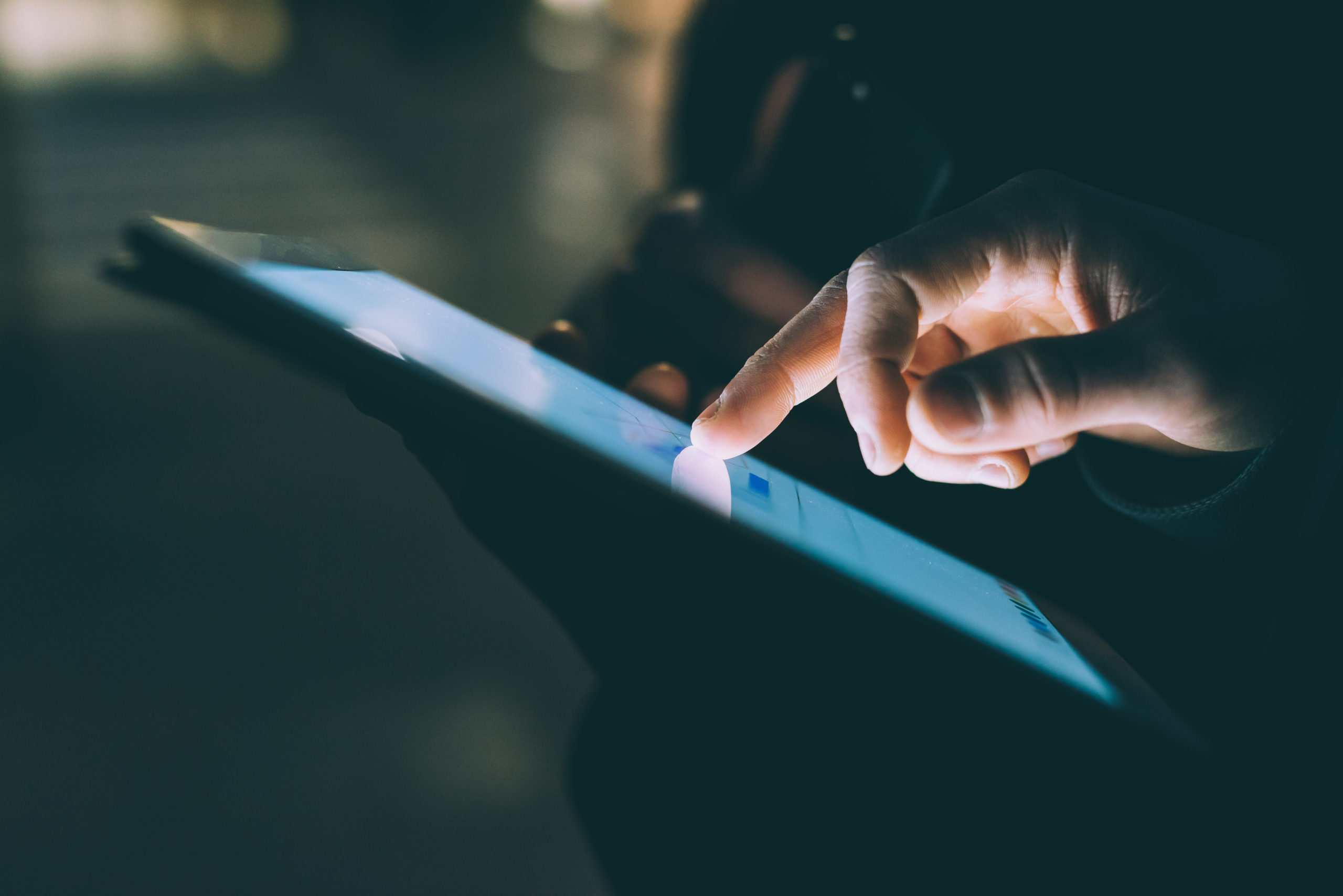 Construction Men Using Fleet Utilization Software on Tablets