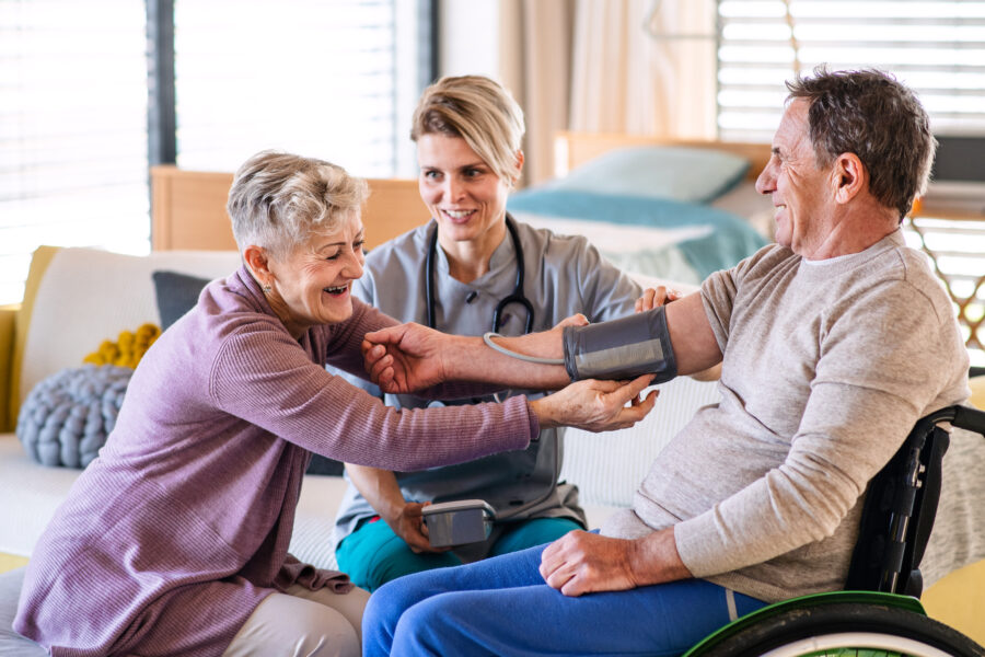 a healthcare worker visiting senior patient in whe 2021 08 27 17 56 08 utc scaled e1690571017535