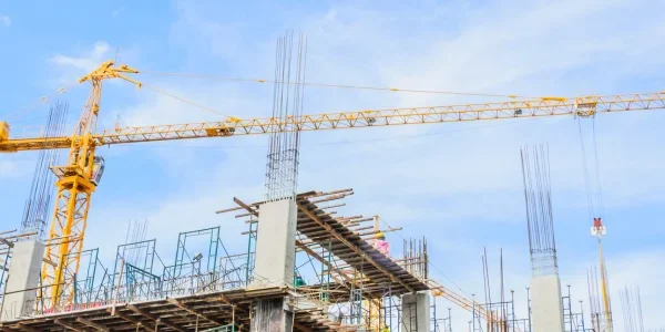 Yellow Crane with Blue Sky Background