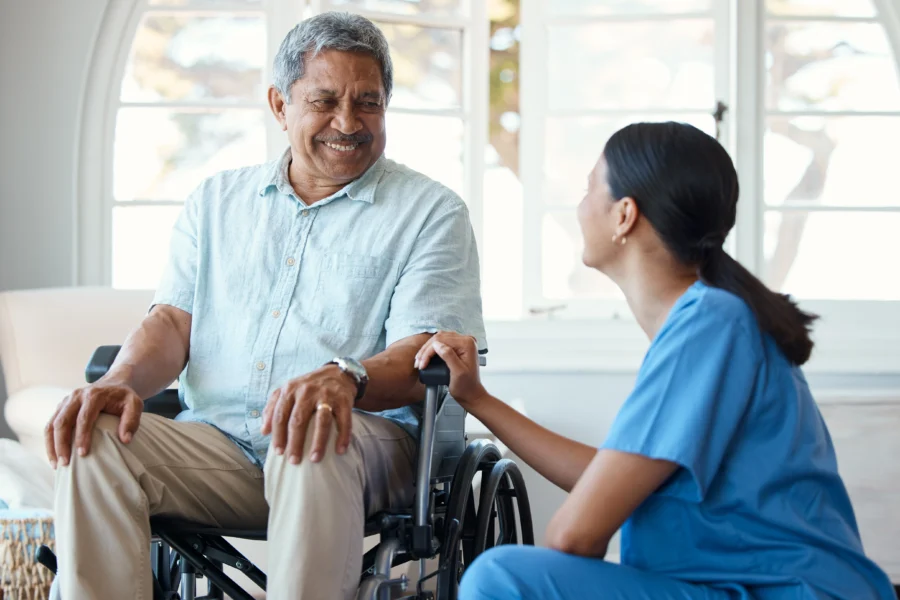 Home Healthcare Nurse and Happy Patient.