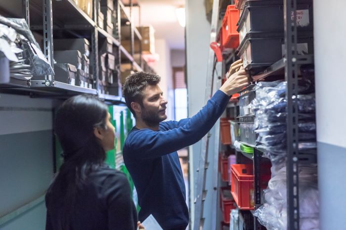 rental branch employees sorting through rental inventory